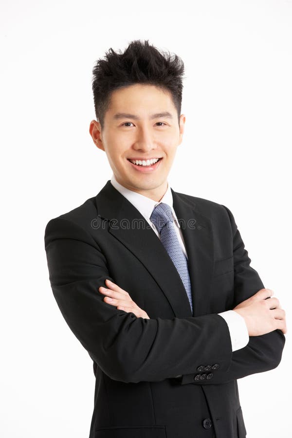 Studio Portrait Of Chinese Businessman