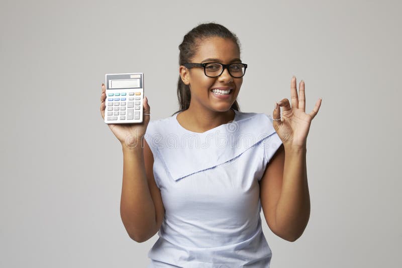 studio portrait female accountant using calculator 79850112