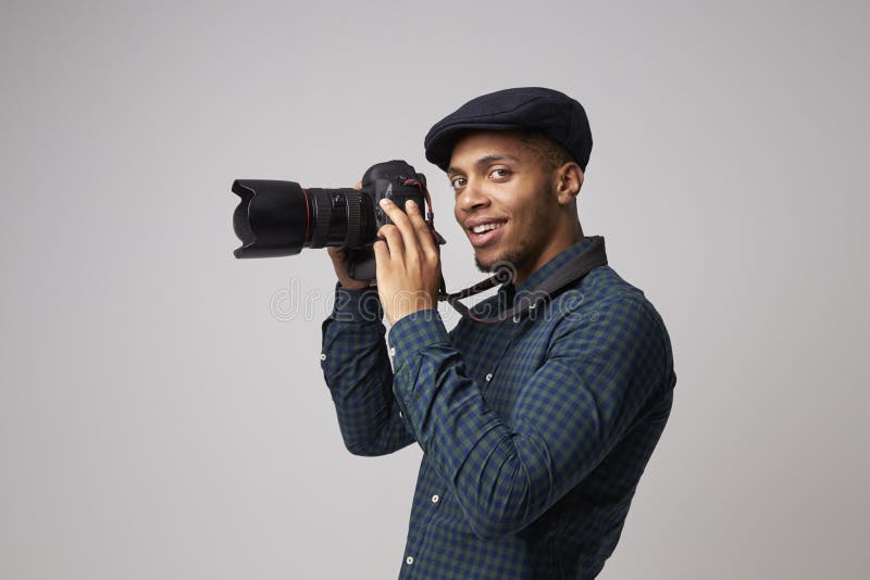 Studio Portrait of Male Photographer with Camera Stock Image - Image of ...