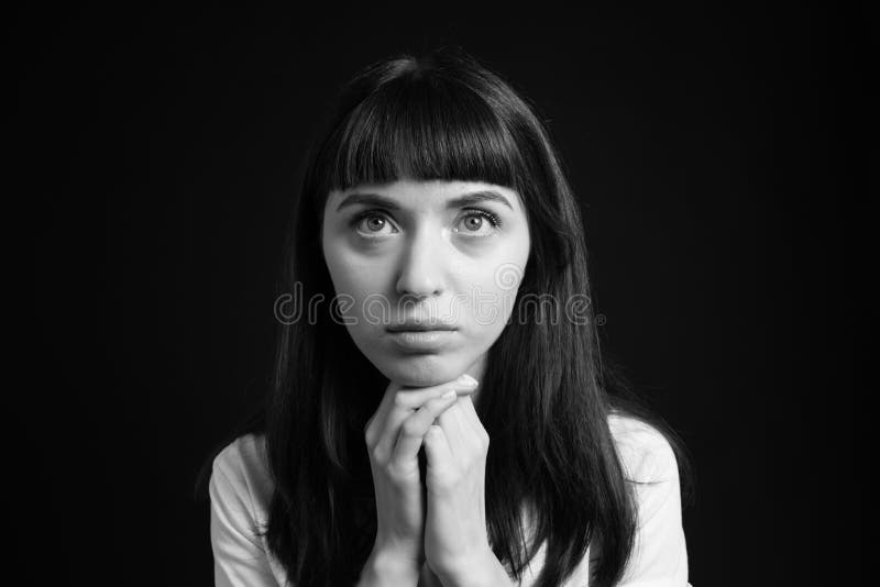 Studio Portrait of a Young Woman Against Plain Black Background Stock ...