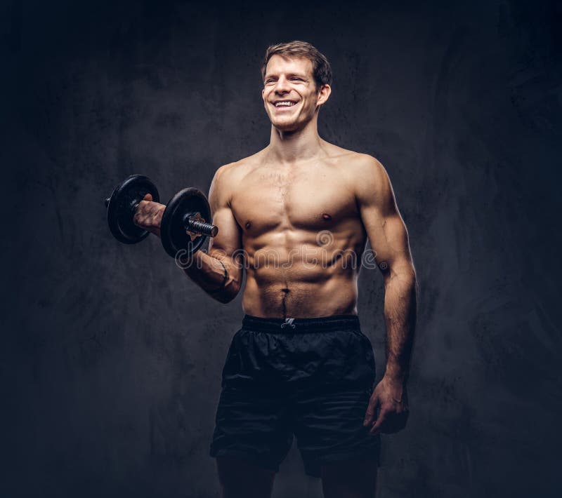 Studio Portrait of a Shirtless Athletic Tattooed Male Stock Image ...