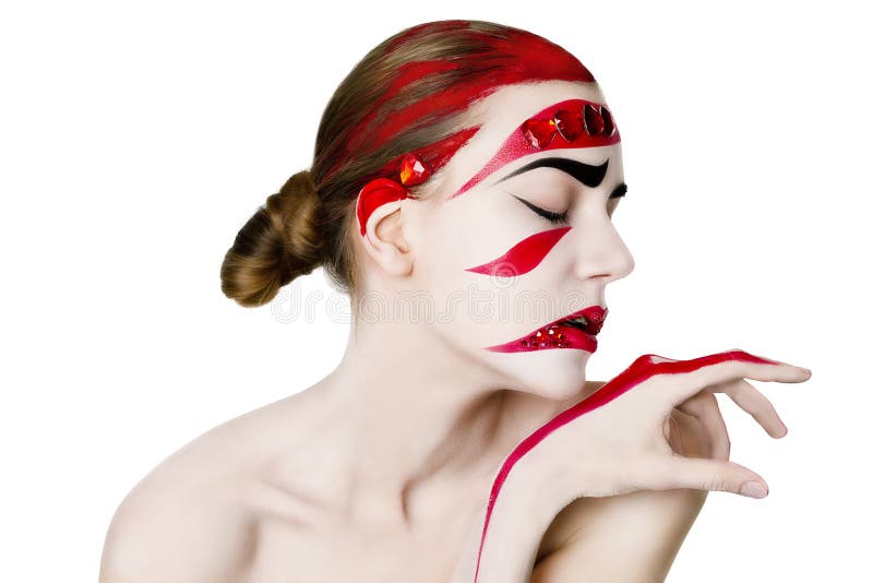 Studio portrait of a woman. Art make-up in red stock photos Studio portrait of a woman. Art make-up in red stock photos