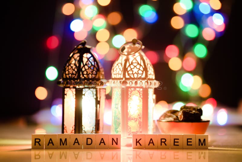 Studio set up shot of lighted lantern - showing ramadan kareem celebration conceptual - vintage toned filter applied. Studio set up shot of lighted lantern stock photo Studio set up shot of lighted lantern - showing ramadan kareem celebration conceptual - vintage toned filter applied. Studio set up shot of lighted lantern stock photo