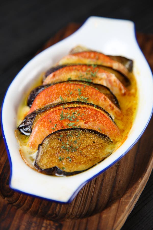 Eggplant Tomato Gratin on a Dining Table Stock Image Image of cheesy, dining 146628971