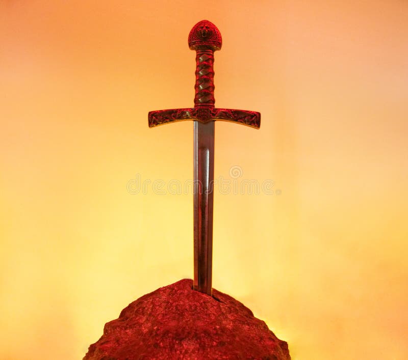 Excalibur the Mythical Sword in the Stone of King Arthur Stock Image