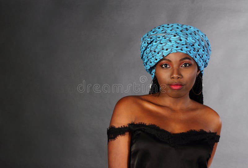 Young black afro girl looking at camera portrait