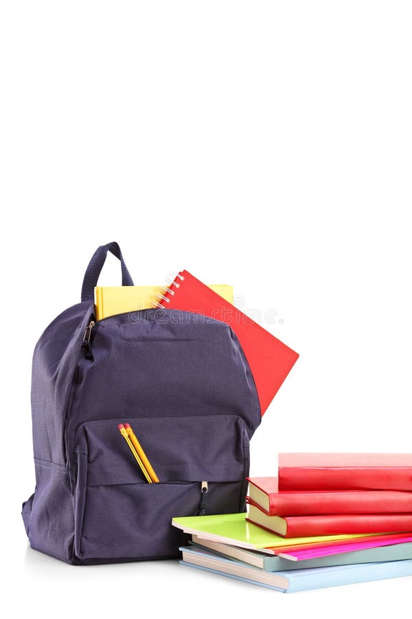 Studio shot of a school backpack with books and notebooks stock photo