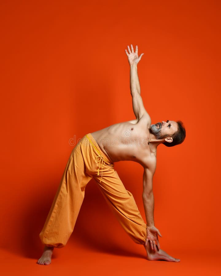 Studio shot of senior bearded man doing yoga poses royalty free stock images Studio shot of senior bearded man doing yoga poses royalty free stock images
