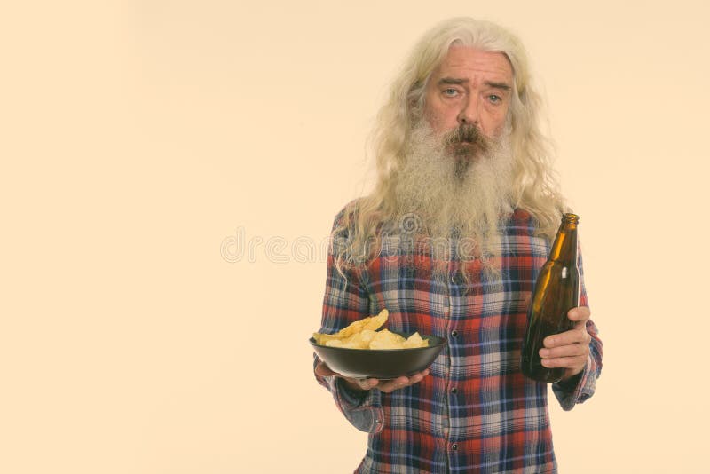Studio Shot of Senior Bearded Man Holding Bottle of Beer and Bowl of Potato  Chips Stock Photo - Image of background, checkered: 198483462