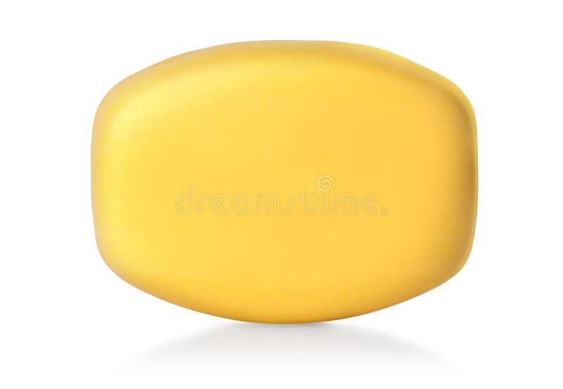 Single oval bar of yellow soap floating on white background royalty free stock photo