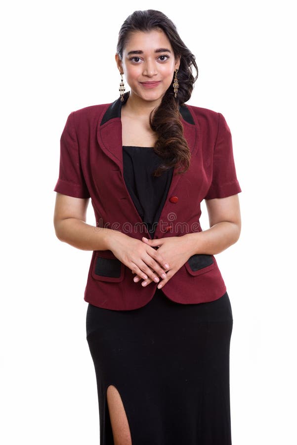 Studio shot of young beautiful Indian businesswoman standing wit royalty free stock images Studio shot of young beautiful Indian businesswoman standing wit royalty free stock images