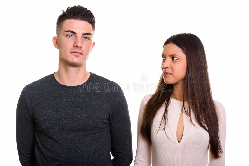 Curious woman staring and looking at handsome man royalty free stock photo.