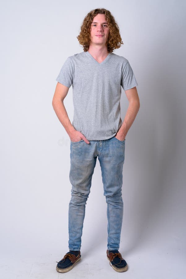Full Body Shot of Young Handsome Man with Curly Hair Stock Photo - Image of  casual, portrait: 141056436
