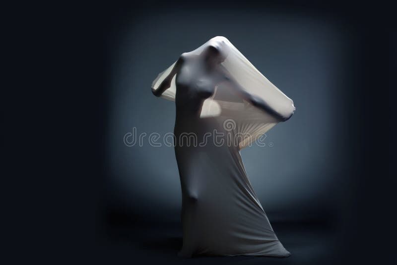 Studio shot of screaming naked female silhouette breaking through cloth. Studio shot of screaming naked female silhouette breaking through cloth