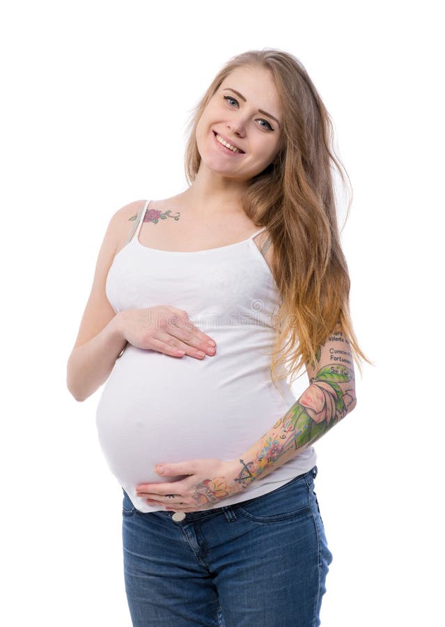 Studiostående av den härliga unga gravida kvinnan arkivfoto Studiostående av den härliga unga gravida kvinnan arkivfoto