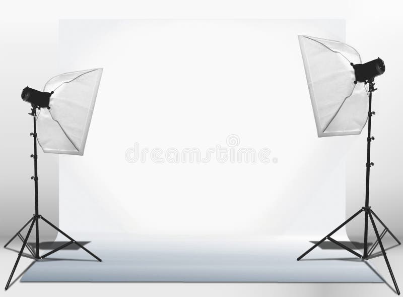 Studio lights set-up with blank white canvas. Studio lights set-up with blank white canvas