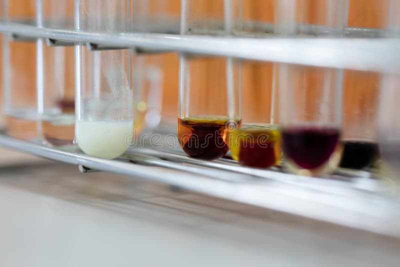 The study Separating by filtration the component substances from liquid mixture. stock photos The study Separating by filtration the component substances from liquid mixture. stock photos