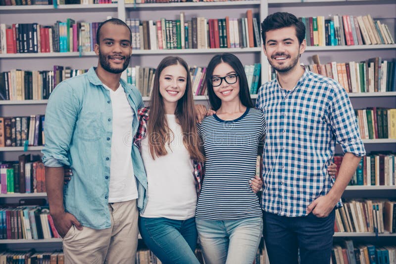 Study together is fun, teamwork,teambuilding concept. Four happy stock photo Study together is fun, teamwork,teambuilding concept. Four happy stock photo