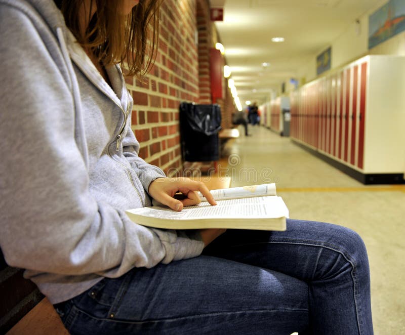 Studying in a college corridor