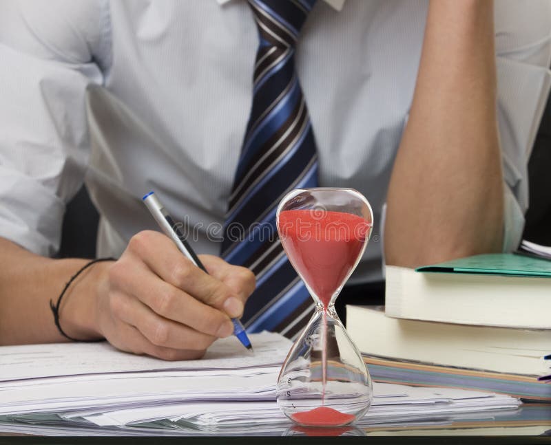Studying under pressure of time royalty free stock photo Studying under pressure of time royalty free stock photo