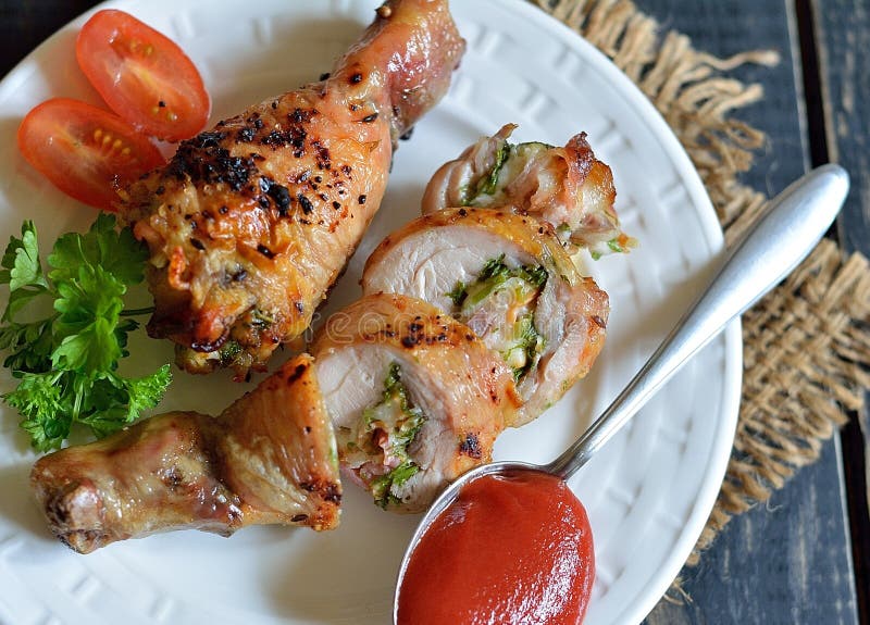 Stuffed Chicken Drumstick Grilled Stock Photo - Image of greens