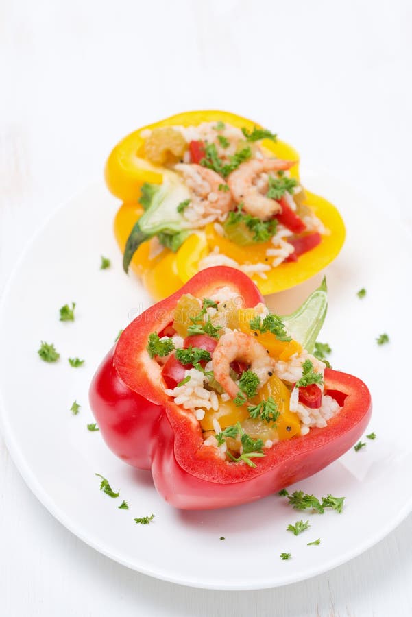 Stuffed Peppers with Salad of Rice and Shrimp on the Plate Stock Image