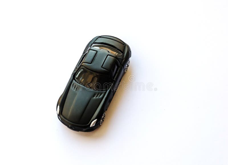 Stuk speelgoed auto op een witte achtergrond stock foto's Stuk speelgoed auto op een witte achtergrond stock foto's