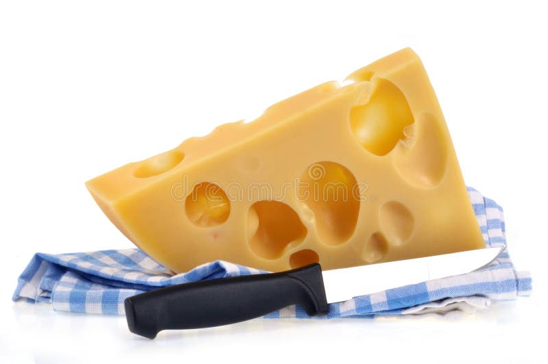 Stuk van emmentaler met een mes royalty-vrije stock foto Stuk van emmentaler met een mes royalty-vrije stock foto