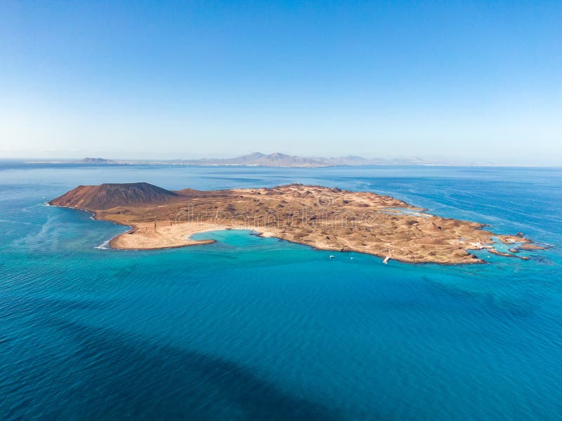 Stunning high angle panoramic aerial drone view of Isla de Lobos, a small uninhabited island near Fuerteventura