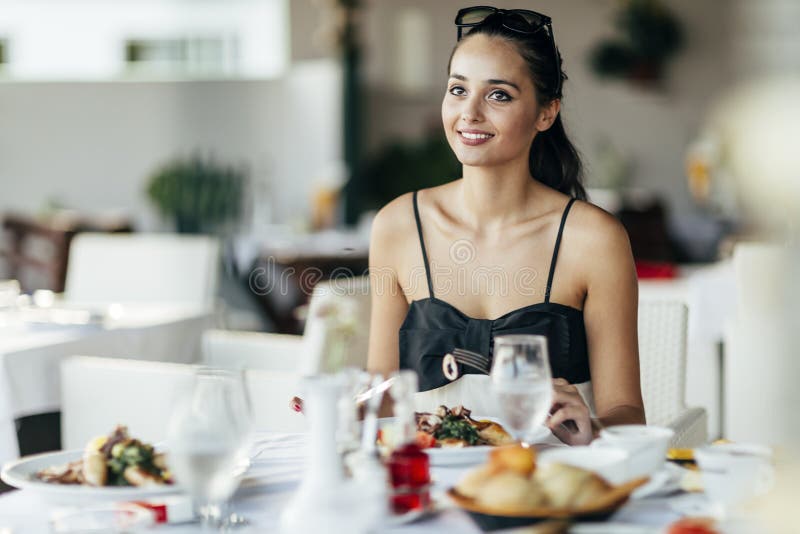 Stunning lady having lunch stock photo. Image of girl 89829816