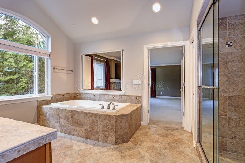 Stunning Master Bathroom with Luxury Spa Tub. Stock Photo Image of