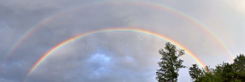 Stunning natural double rainbows plus supernumerary bows seen at a lake in northern germany royalty free stock image Stunning natural double rainbows plus supernumerary bows seen at a lake in northern germany royalty free stock image