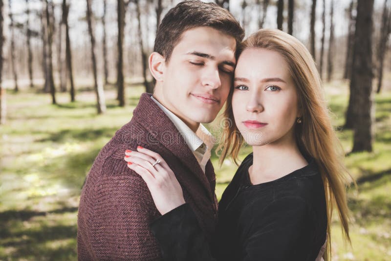 Sensual Outdoor Portrait Of Young Stylish Couple Posing In Field Stock