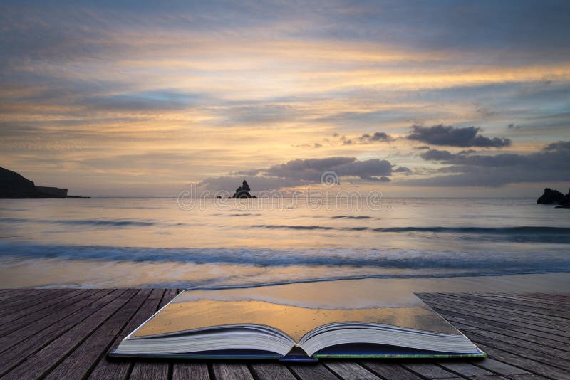 Stunning sunrise landsdcape of idyllic Broadhaven Bay beach on Pembrokeshire Coast in Wales in pages of imaginary story book. Stunning sunrise landsdcape of idyllic Broadhaven Bay beach on Pembrokeshire Coast in Wales in pages of imaginary story book