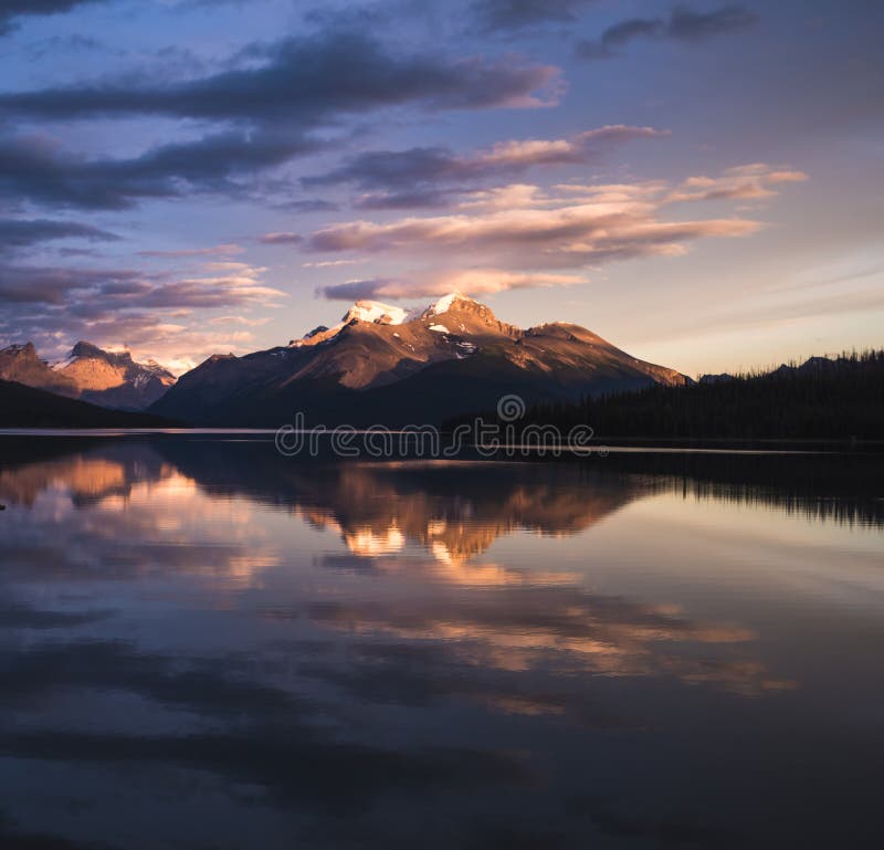A stunning sunset over Maligne Lake of Jasper National Park royalty free stock photos A stunning sunset over Maligne Lake of Jasper National Park royalty free stock photos