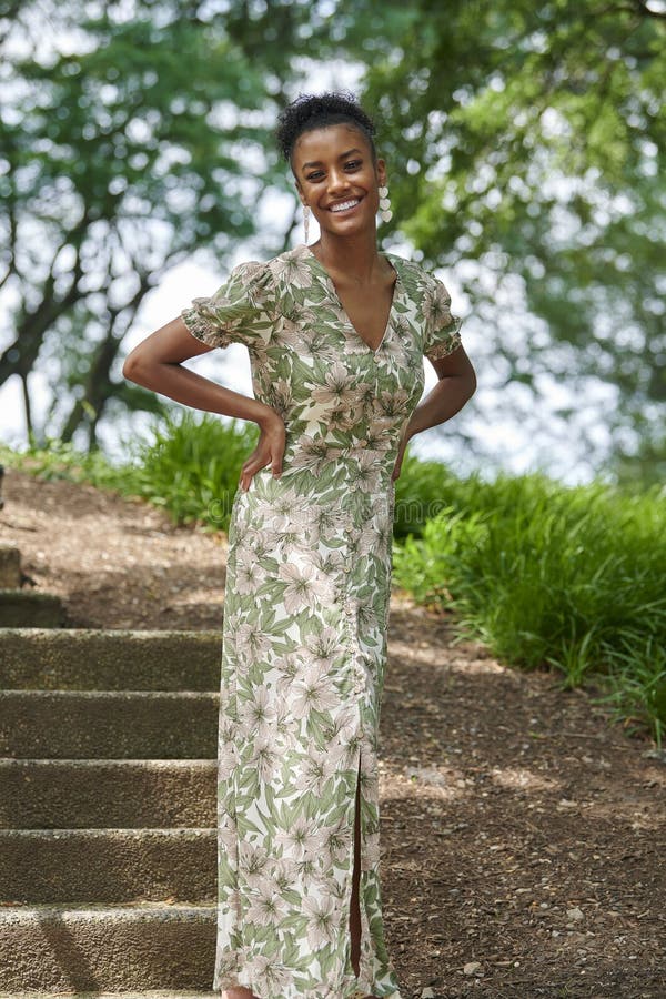 Stunning Young African-American Woman Poses in Long Dress Stock Photo ...