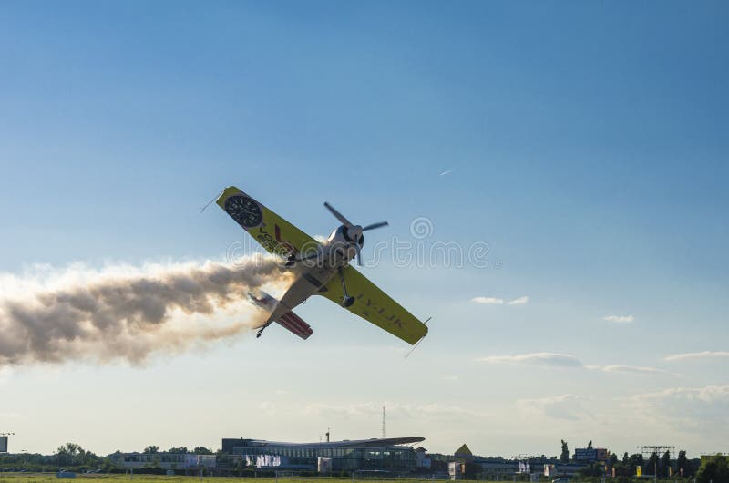 Stunt plane with smoke