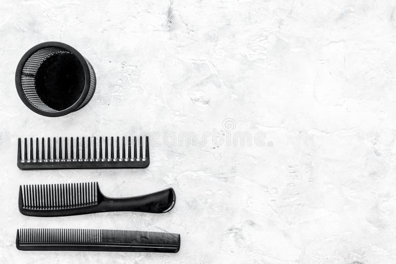Download Styling Hair With Combs And Tools In Barbershop On Stone ...