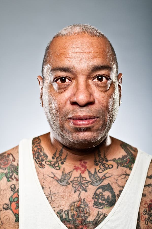 Stylish African American Man With Many Tattoos. Stock Image - Image of