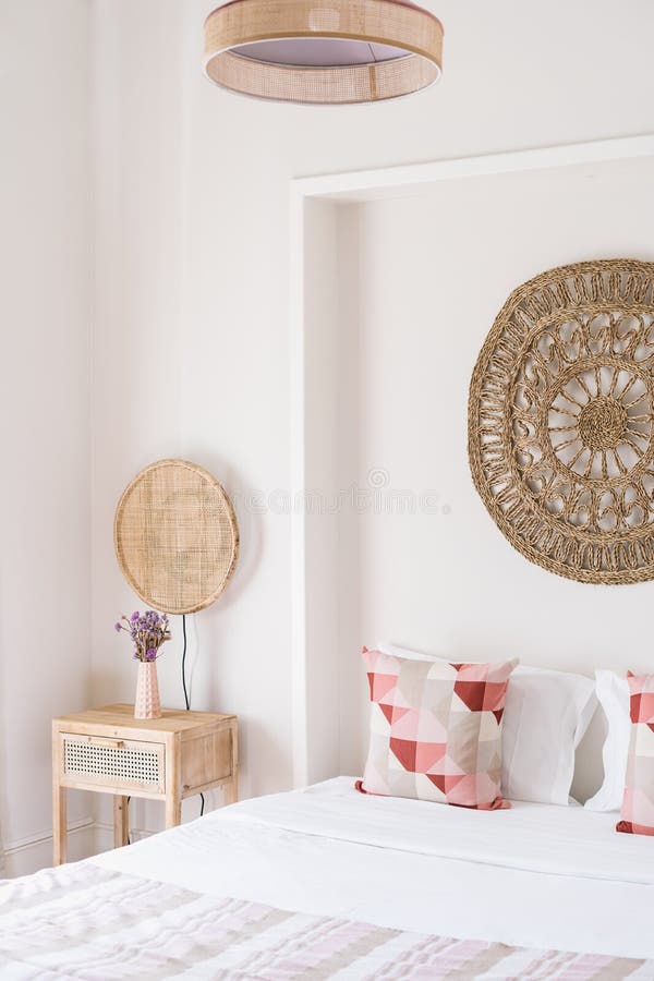 Stylish Bed and Bedside Table in Feng Shui Styled House Stock Photo ...