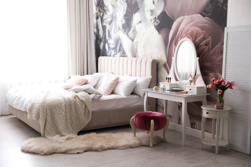 Bedroom Interior with Elegant Dressing Table and Floral Wallpaper Stock