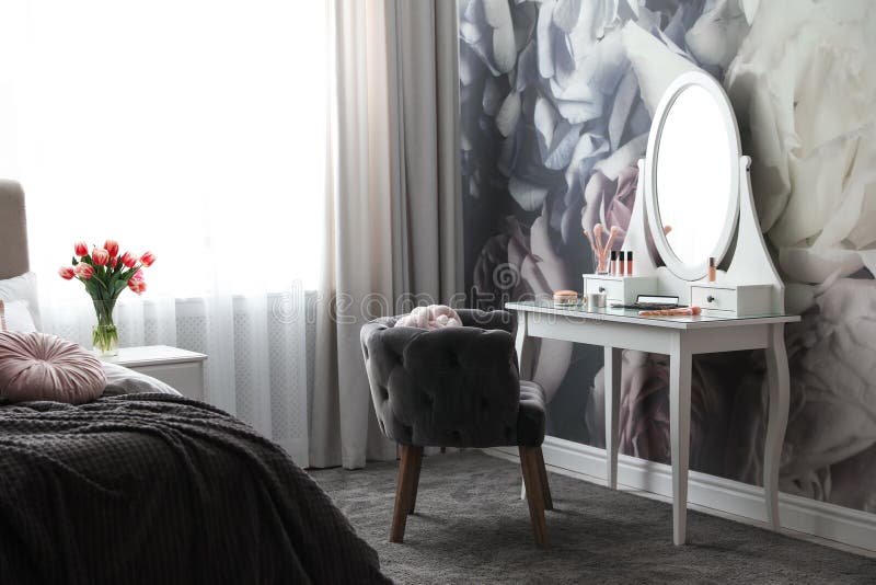Bedroom Interior with Elegant Dressing Table and Floral Wallpaper Stock