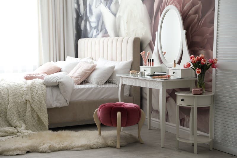 Bedroom Interior with Elegant Dressing Table and Floral Wallpaper Stock