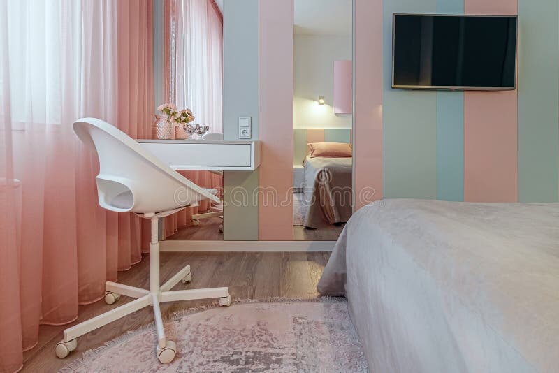 Stylish Bedroom Interior with an Elegant White Toilet Table, with