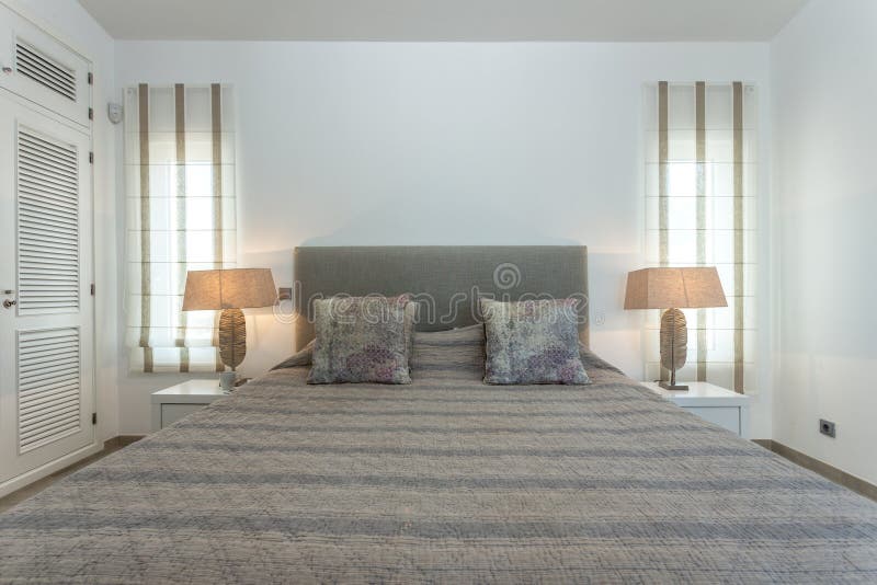 Stylish bedroom in a modern house. For family. royalty free stock images