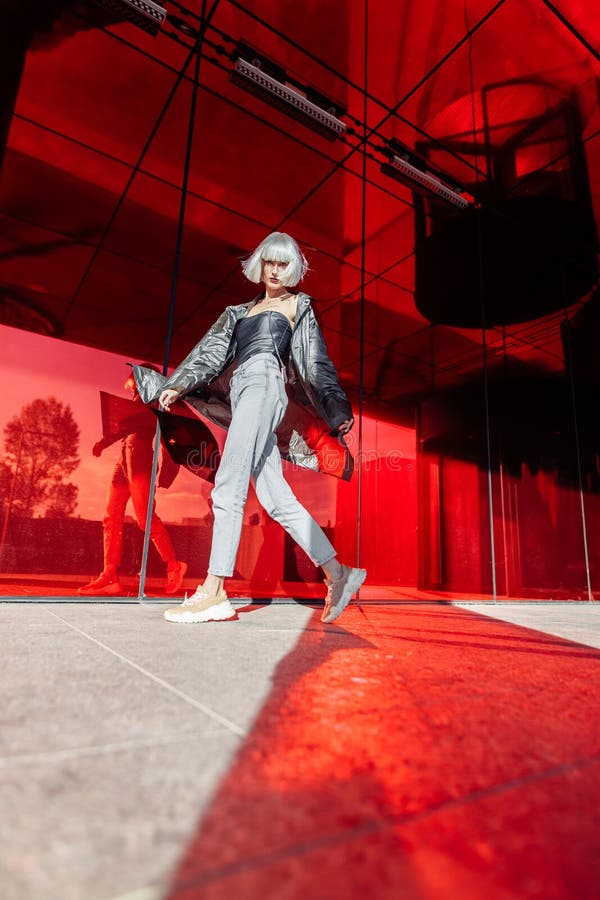 Fashion of the Future. Futuristic Blonde in Red Space Stock Image