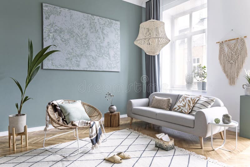 Boho interior design of living room with rattan armchair.