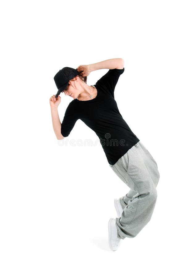 Stylish guy dressed in casual clothes trousers and t-shirt poses in the  street on the background of Stock Photo by leikapro