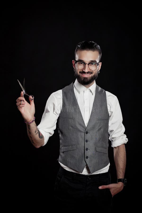 Stylish Hairdressers in the Studio with Scissors and Comb Stock Image