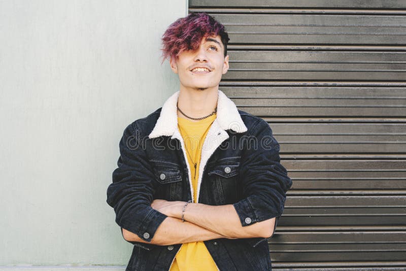 Stylish Handsome Teenage Boy in Denim Jacket with Burgundy Hair Color and  Arms Crossed Looking Up and Smiling. Happy Stylish Stock Image - Image of  looking, color: 232746741